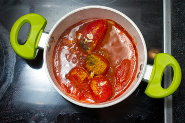 Appetizing tomatoes sauce preparation