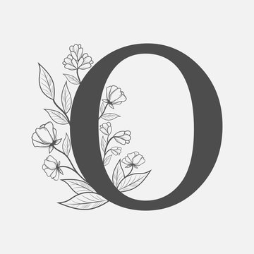 Uppercase Letter O with flowers and branches. Vector flowered monogram or logo. Hand Drawn concept. Botanical design branding. Composition of letter and flowers for wedding card, invitations, brand