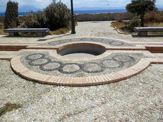 Dry circular water feature in Tarifa square