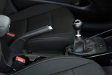 manual gear shift and handbrake inside the passenger car
