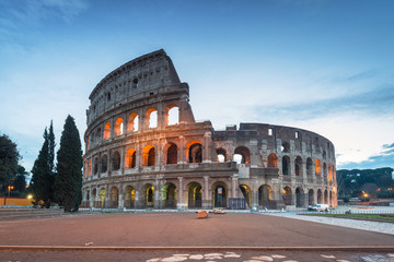 The Colosseum in Rome illuminated at dawn, Italy