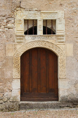 door of a medieval mansion in couture-sur-loir (france)