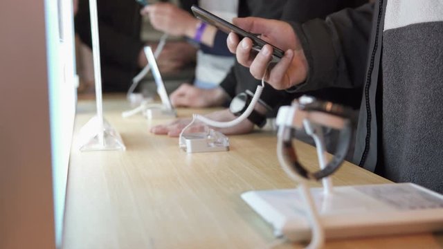 Buying a phone and smart watches in the store