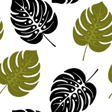 Seamless tropical pattern with green and black palm leaves