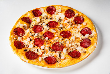 Hot Homemade Pepperoni Pizza on the white background