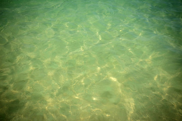 Small waves lapped the beach