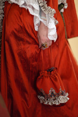 Retro style royal medieval ball - Majestic palace with gorgeous people dressed in king and queen's friends dresses with accessories such as fan and hand puch as a handbag - 2019 © dissx