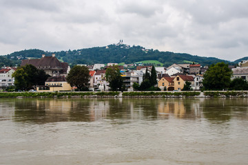 Fototapeta na wymiar A view on the left bank of Danube in Linz near Nibelungenbrucke