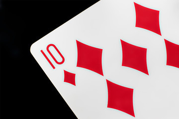 close up playing card isolated on black surface b