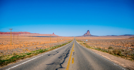 Fototapeta na wymiar Endless road to Monument Valley in Utah - travel photography