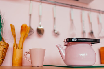 kitchen utensils on wooden background