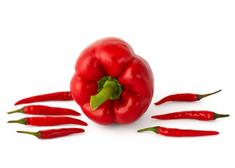 Bell peppers and chili peppers on white background