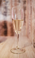 two glasses of champagne on a table