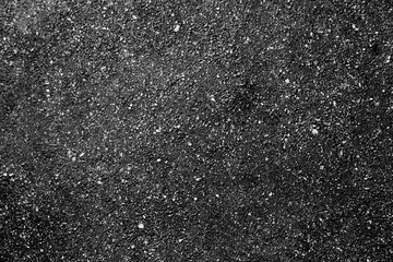 Abstract black and white texture of fine small stony surface for background.