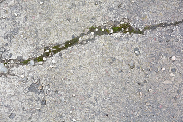 cracked slab of crushed stone with concrete