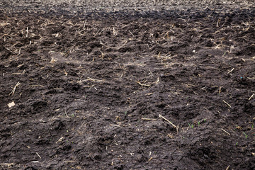 Earth Soil Grooves Farming Earth soil grooves over field. Sepia effect natural organic soil texture. Soil texture. organic matter background with sand, road metal and chippings.