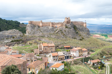 Fototapeta na wymiar medieval townwith old castle at hill, Spain