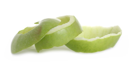 Green apple curl peel isolated on white