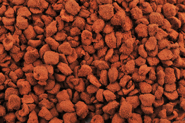 Brown instant coffee powder background and texture