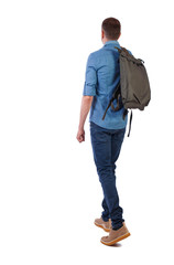 back view of walking  man  with green bag.