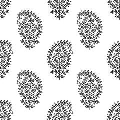 Woodblock printed seamless paisley pattern. Traditional oriental ethnic ornament of India, black on white background. Textile design.