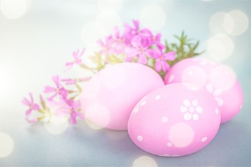 Easter eggs and pastel colored flowers