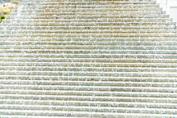 abstract view of an artsy water fountain pyramid with water flowing and trickling down