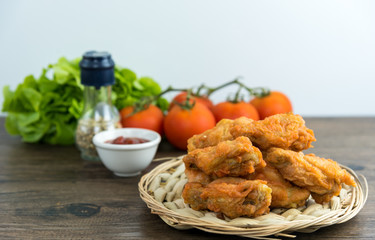 crispy kentucky fried chicken in a wooden table - junk food and unhealthy food.  Breaded Crispy Spicy Fried Chicken tasty dinner
