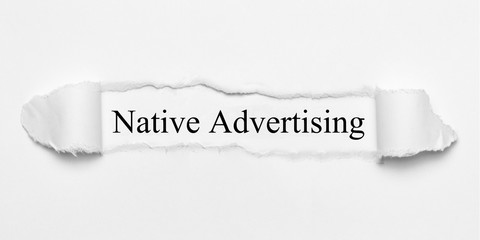Native Advertising on white torn paper
