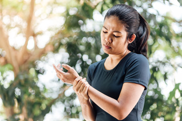 young asian women suffer from wrist pain, Painful Concept 