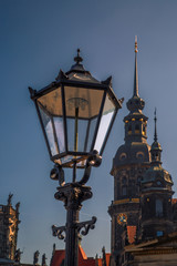 Fototapeta na wymiar Street lamp and the ancient temple in Dresden