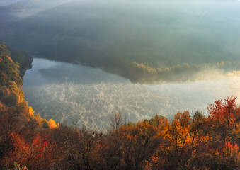 autumn sunrise over the river. canyon of the picturesque river. autumn morning