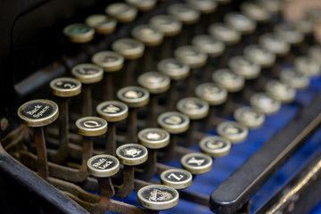 Close up of alphabet keys on a vintage manual typewriter.