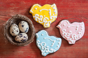Colorful easter cookies on a wooden background