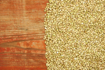 raw green buckwheat background, vegan food