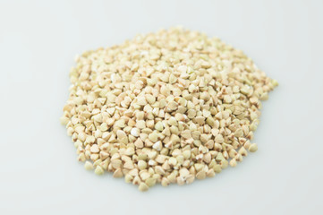 Sprouts of green buckwheat in a bowl. Macro shot. Raw buckwheat. Useful food from buckwheat sprouts for vegetarian food.