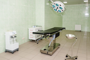 Equipment and medical devices in modern operating room. Surgical room modern equipment in the hospital.