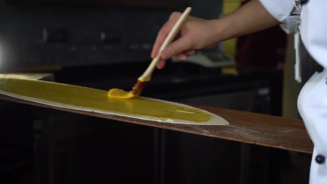 preparing cheese pita in a restaurant