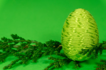 Fototapeta premium Happy Easter symbol egg on green background