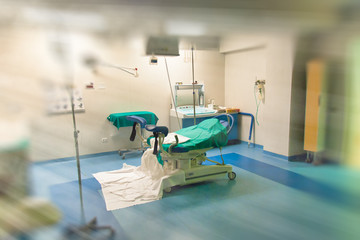 View of an empty hospital bed in the maternity ward at a hospital