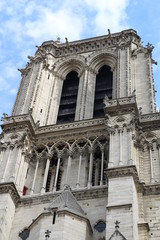 The roof of the iconic Notre Dame Cathedral. Notre Dame Cathedral in Paris, the symbol of the beauty and history. Construction began in 1163 and was completed in 1345.Sunny summer day in France City. 