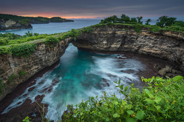 Broken beach on Nusa Penida island at sunrise