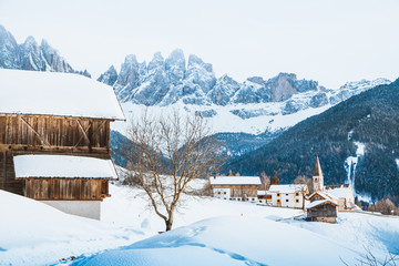 Fototapeta premium Dolomites mountain peaks with Val di Funes village in winter, South Tyrol, Italy