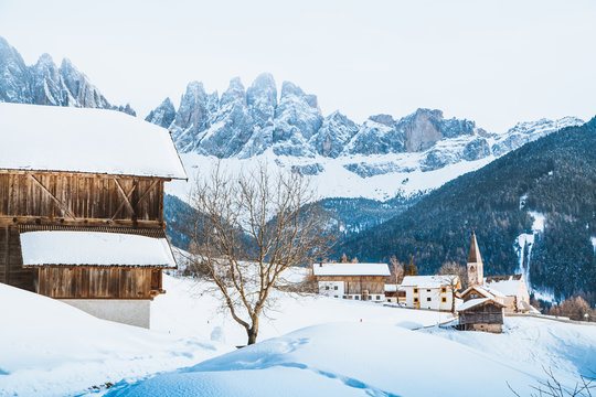 Dolomites Mountain Peaks With Val Di Funes Village In Winter, South Tyrol, Italy