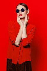 fashion model in sunglasses, beautiful young woman.