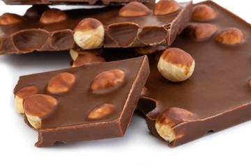 chocolate with nuts isolated on white background.