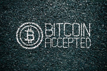 Fototapeta na wymiar Bitcoin Accepted Chalk Drawings on Asphalt Ground, Suitable for Business Investment Concept.