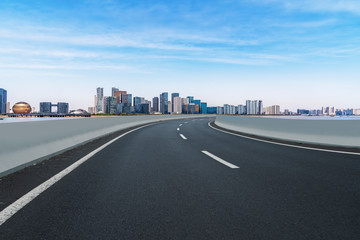 Road and skyline of urban architecture