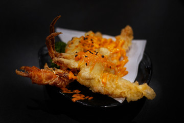 Japanese food: Crab Tempura served with Japanese cooked rice on table. Clean food concept. Toned image. Selective focus and free space for text.