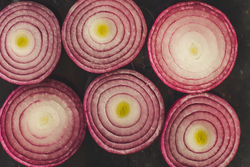 Red onion. juicy fresh vegetable cut, slices. food background. top view